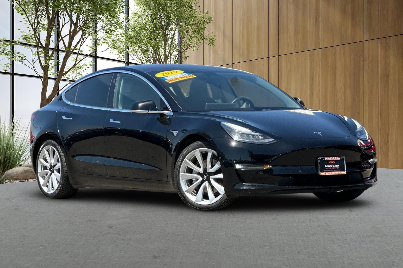 Used 2019 Tesla Model 3 Mid Range with VIN 5YJ3E1EAXKF310604 for sale in Madera, CA